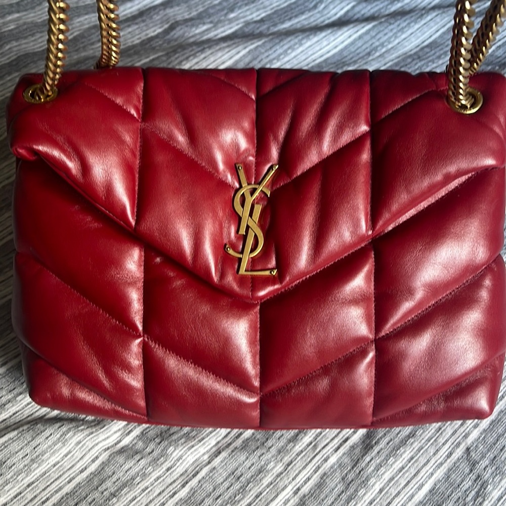 Red Saint Laurent large puffer shoulder bag.